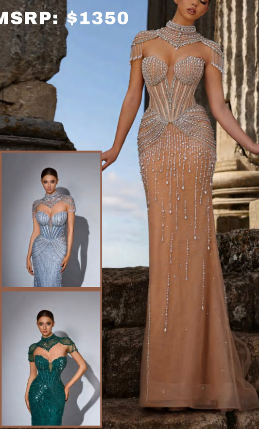 Dress embellished with sparkling crystals and gemstones, featuring a high neckline with jewelry draping from the shoulders.”