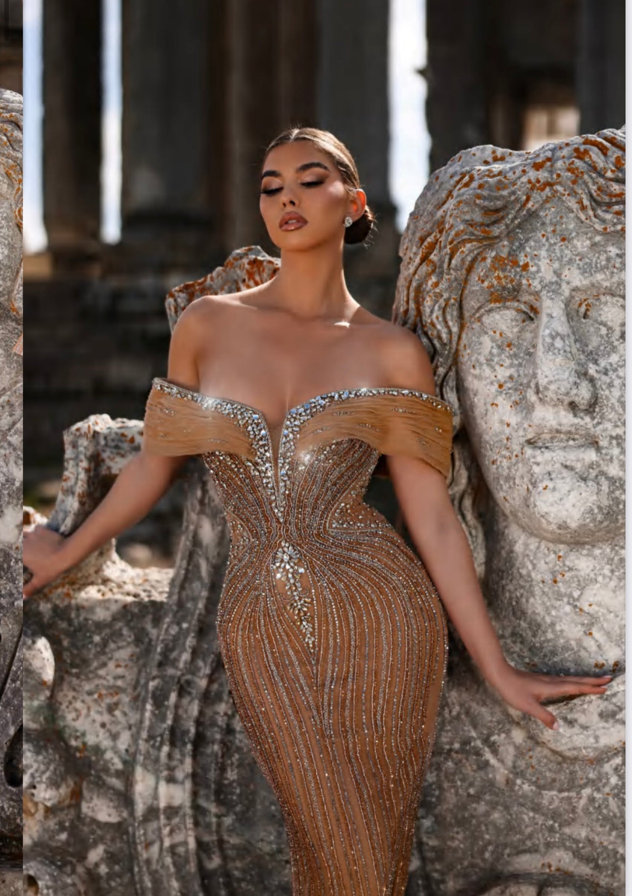 Elegant luxurious dress embellished with crystals and gemstones, featuring off-shoulder design.”