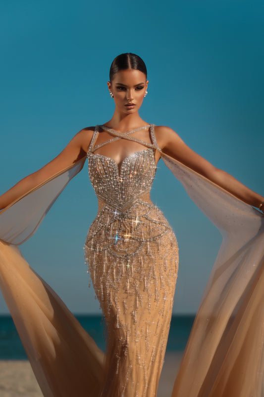 Elegant dress embellished with rhinestones, featuring long sleeves