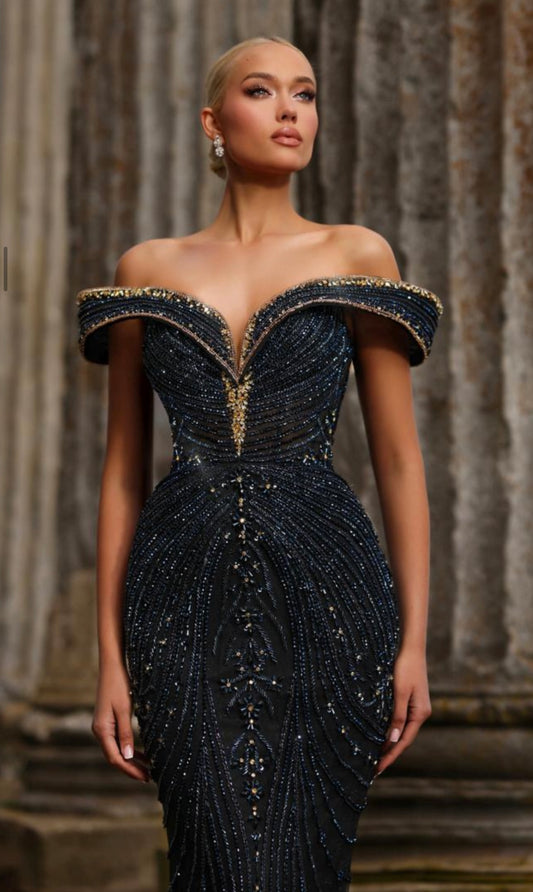 Elegant luxurious dress embellished with crystals and gemstones, featuring off-shoulder design.”