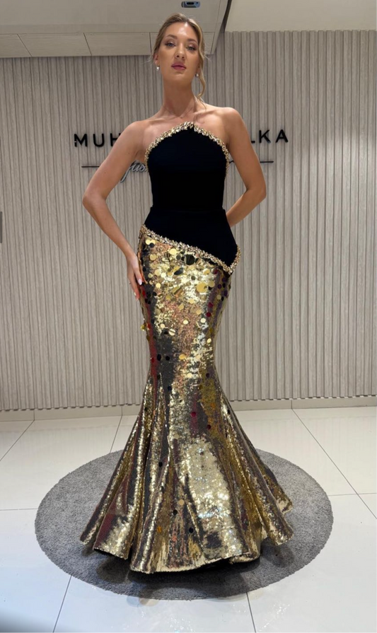“An elegant dress from the haute couture collection, featuring an exclusive design.”
