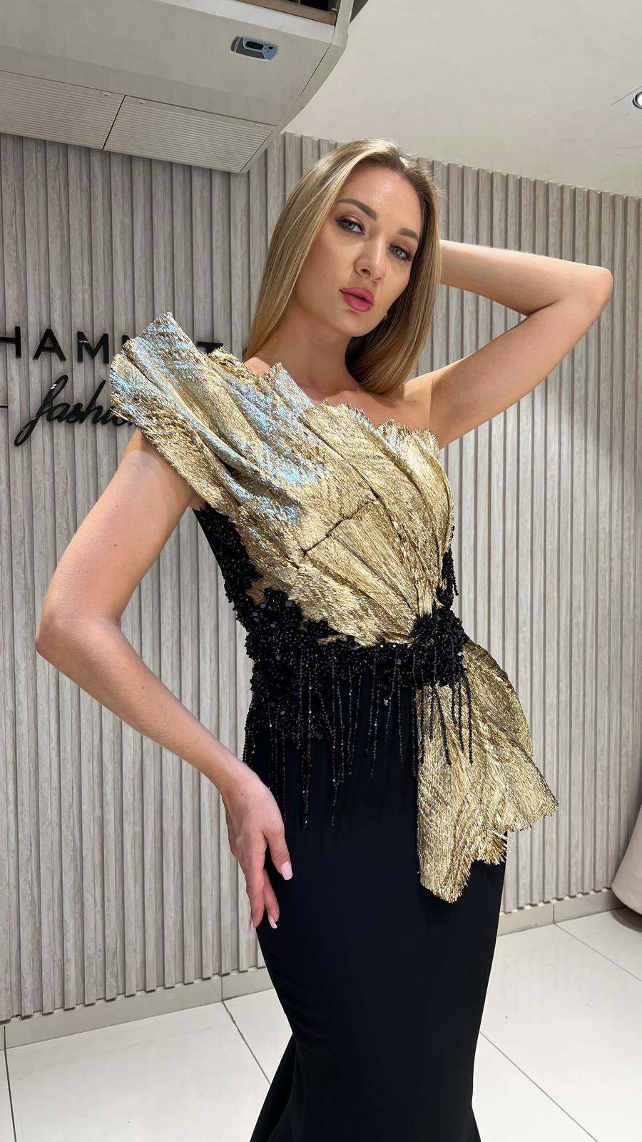 Elegant dress from the haute couture collection, featuring an exclusive design.