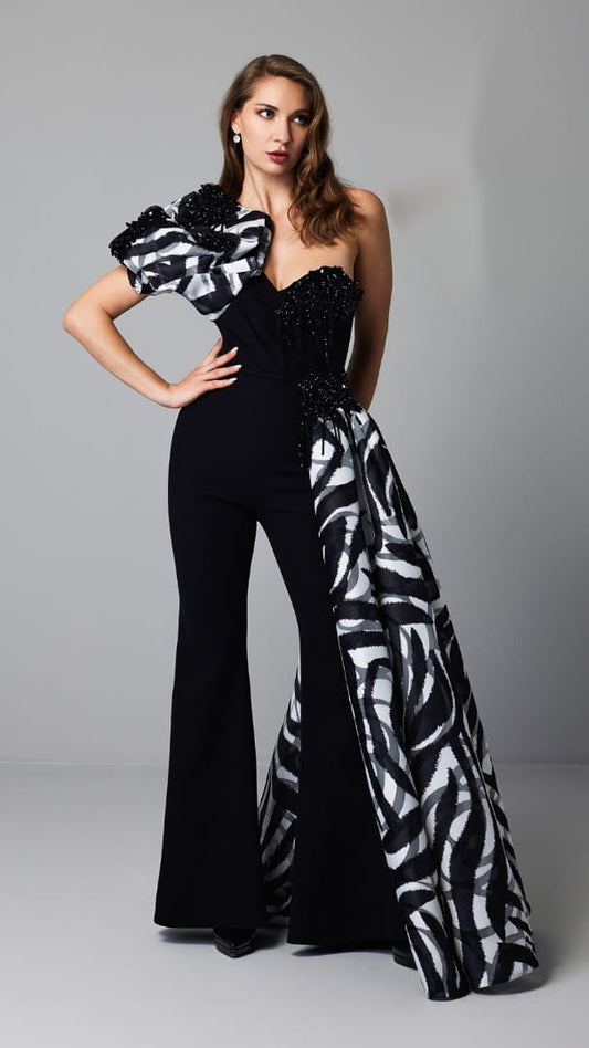 Elegant jumpsuit with a unique design, part of the haute couture collection, featuring an exclusive style.